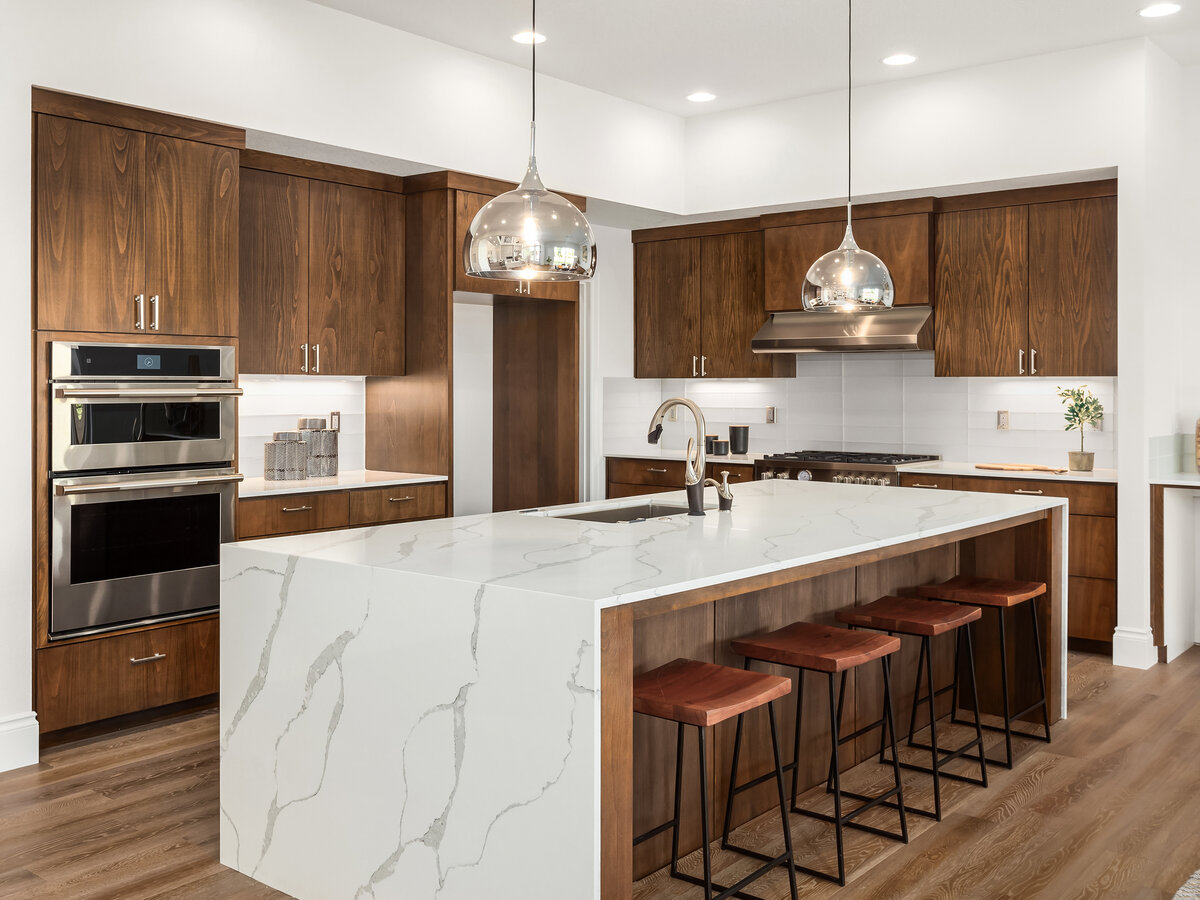 Kitchen with wood cabinets and granite countertop